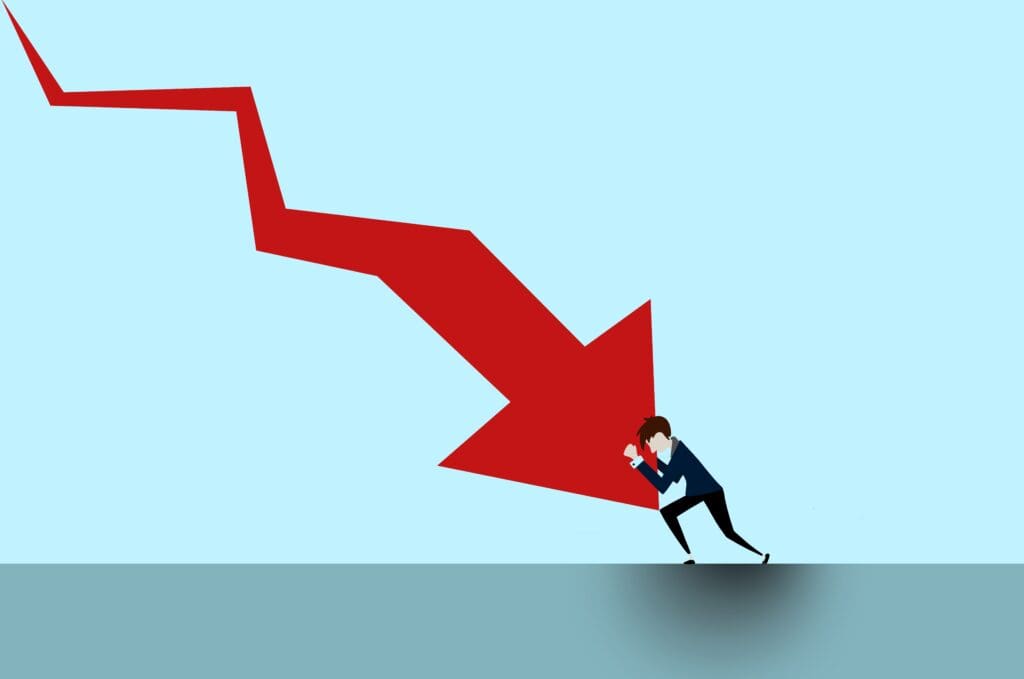 Illustration of a person attempting to hold up a large red downward arrow, symbolizing financial decline or struggle.